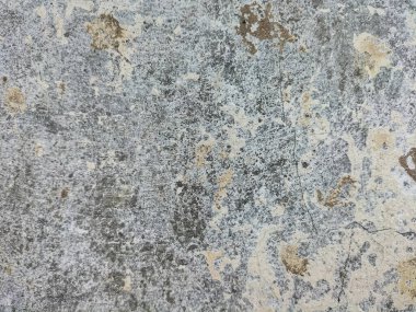 Güzel bir deseni olan eski bir beton duvarın dokusu. Seçici odak.