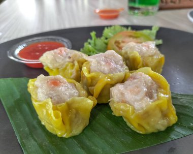 Lezzetli, buharda pişirilmiş Çin yemeği, Çin yemeği. Lezzetli Dim Sum. Kahvaltı, öğle yemeği ya da akşam yemeği. 