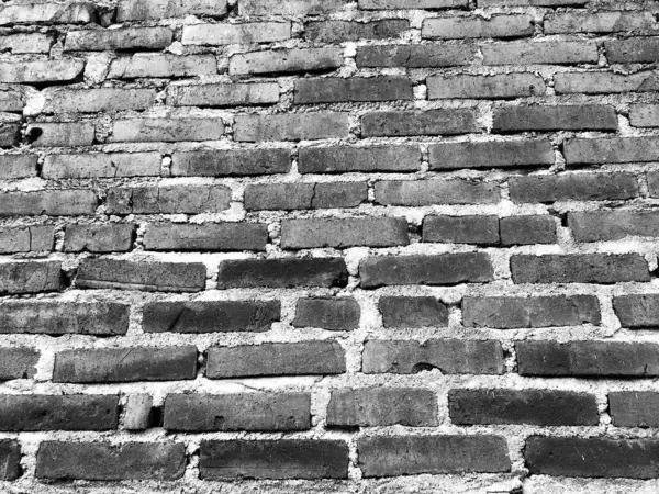 Seçici odaklanma. Temiz düzenlenmiş kırmızı tuğladan yapılmış duvarların görüntüsü. Eski tuğla duvar. Sert tuğla duvar. Geçmişi. Doku.