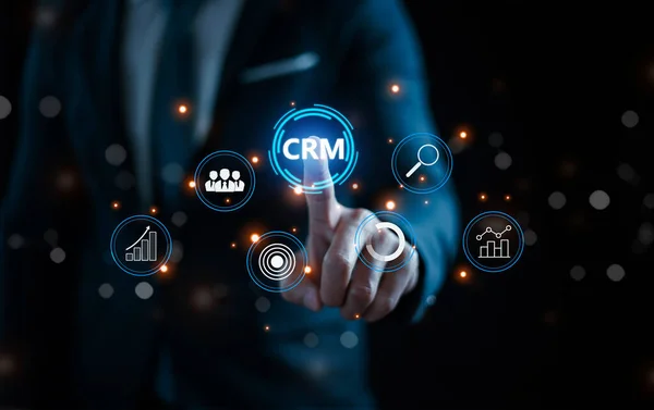 CRM. Customer Relationship Management, Businessman or client show global structure customer network technology, Data exchanges development, Customer service, Digital marketing online, Social media, HR