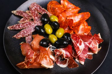 Jamon Serrano, Jamon Iberico, Fuet, Chorizo, Morcilla.