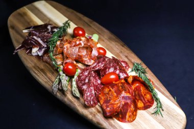 Jamon Serrano, Jamon Iberico, Fuet, Chorizo, Morcilla.