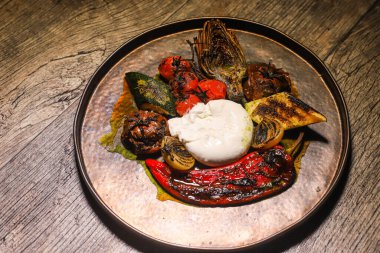 Creamy Italy burrata cheese with grilled vegetables