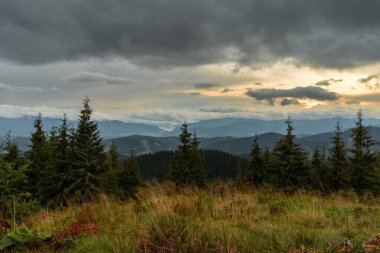 Beautiful landscape. Beautiful mountain landscape with a fiery sky. Sunset in the mountains. Beautiful view of the mountains and sunset. Front view.