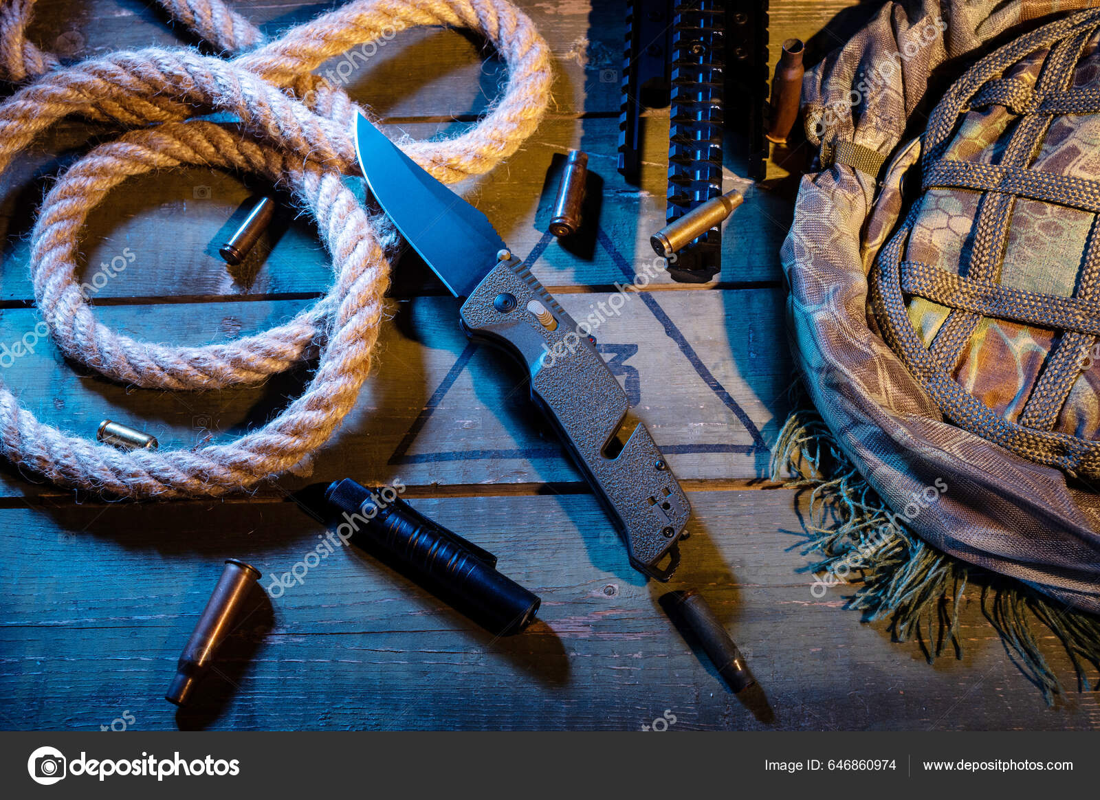 Military Composition Knife Rope Rope Sleeves Military Box Warm Yellow Stock Photo by ©vzwer