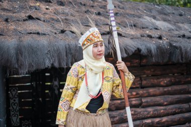 Jakarta, Indonesia - October 2 2023: Tourists in Papua Traditional Attire