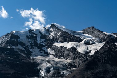 Switzerland, panoramic view of Swiss Alps snow mountain peaks, Kandertal, ski resort, Bernese Oberland clipart