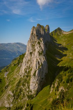 Aerial shot of the Chruzberg summit ridge, also known as Kreuzberg, located in the Swiss canton of St. Gallen on the eastern edge of the Alpstein. Mountain called Saxer Lucke next to Staubern clipart