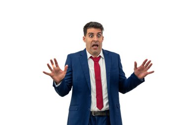 Bir işadamının korku dolu bakışları ve korku dolu bakışları ile ellerini reddedilme jesti ile uzatır. Kurumsal paniği somutlaştırıyor ve beyaz arka planı korkutuyor.
