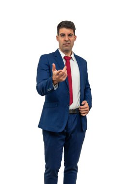 vertical businessman pointing the camera with an expression of confusion and disapproval. His furrowed brow and puzzled gaze suggest that he is confronted with something unexpected white background clipart