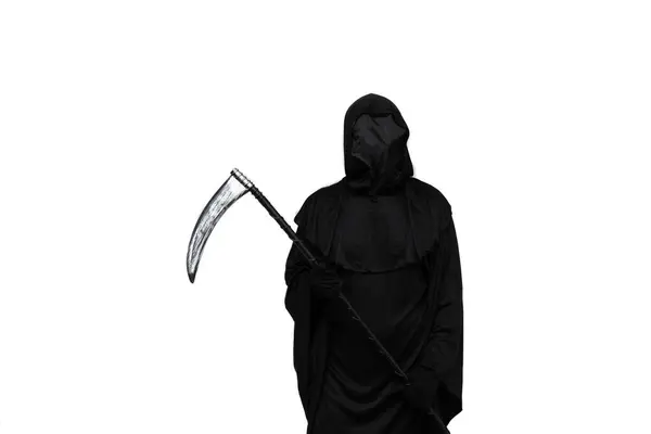 stock image The grim reaper, dressed in a Halloween costume with a dark cloak, holds a scythe menacingly. The image embodies the spooky and eerie vibe of Halloween white background