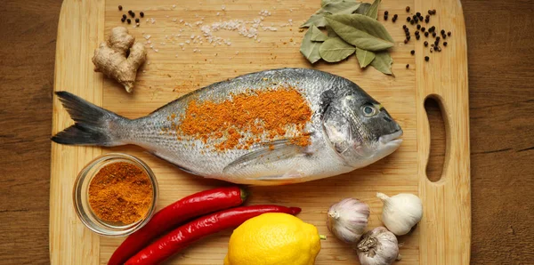 Recipe for dorado, sea fish dinner. Food rich in vitamins.