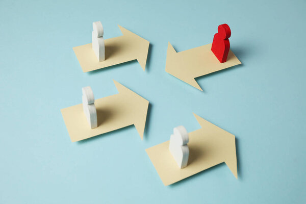 Figures of people and arrows, confrontation in business, struggle for success.