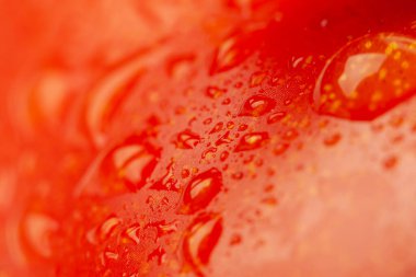 Kırmızı taze domates arkaplanı, süper makro. Olgun organik sebze dokusu.