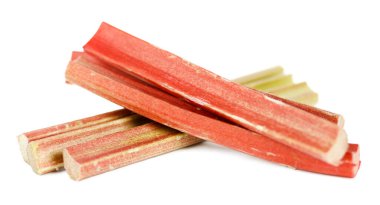 Sour rhubarb on a white background, vitamins in plants.