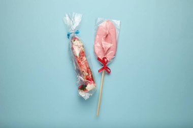 Two sweet candy in form of penis and vagina. Sexual relationship as couple, foreplay and pleasure.