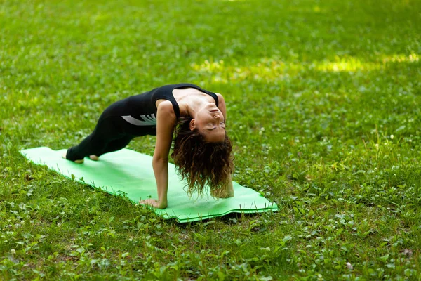 Woman Practices Yoga Morning Park Fresh Air Inverted Staff Pose — Zdjęcie stockowe
