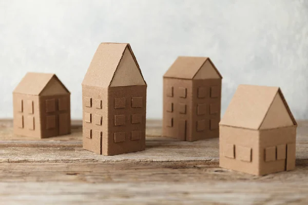 Cardboard Toy Houses Wooden Background Sale Rental Housing Neighbors House — Fotografia de Stock