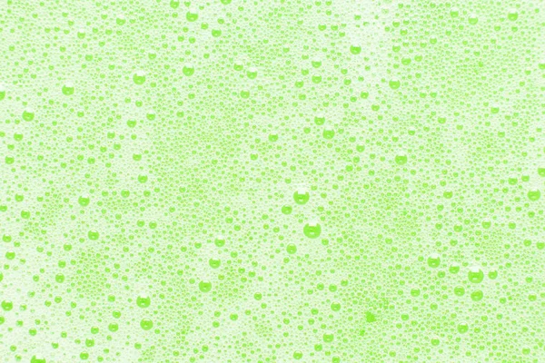 緑の石鹸は シャンプーの泡を吸う — ストック写真