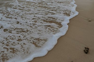 Kumda deniz dalgalarının arkaplanı