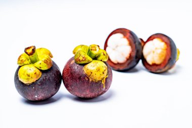 Mangosteen fruit isolated on white background. Mangosteen is known as a fruit that has very high levels of antioxidants. Garcinia mangostana clipart