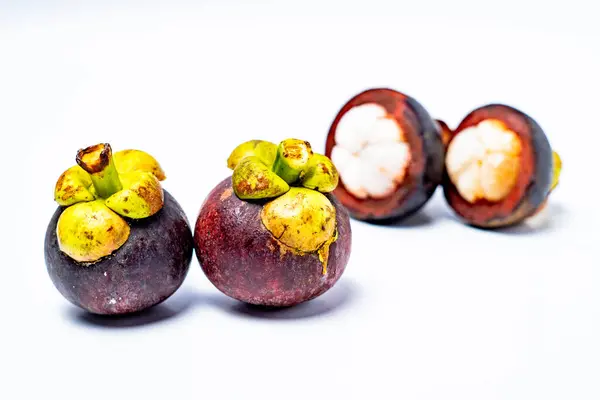 stock image Mangosteen fruit isolated on white background. Mangosteen is known as a fruit that has very high levels of antioxidants. Garcinia mangostana