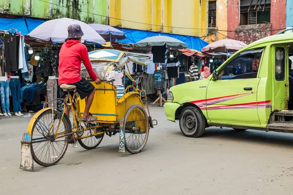 stock image Ambon, Indonesia - June 29, 2024: pedicab at traditional market. Pedicab is a three-wheeled pedal vehicle, an alternative form of transportation in Asia, especially in Indonesia