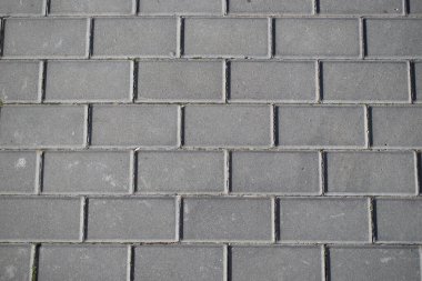 Bir kaldırımın kaldırım taşı döşemesi.