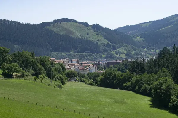 stock image Green mountainous landscape with Legazpi village, Guipuzcoa (Spain)