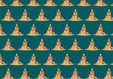 Mum desenli kurabiyeler ve koyu yeşil arka planda Noel bastonu.