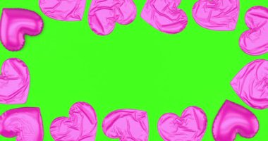 Parlak Pembe Şişiren Kalp Yansıtıcı ve Parlak Balonlar Çerçeveyi Doldurun. Sevgililer Günü, Anneler Günü ve 8 Mart Yeşil Ekran 3D 4K animasyon.