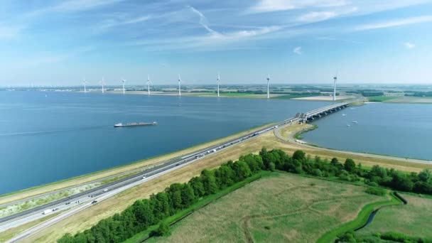 Cargo Ship Approaching Bridge Lakes Flevoland Belanda Drone Footage — Stok Video