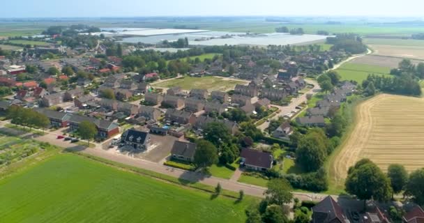 Nederlands Dorp Sexbierum Fietsers Langs Een Plantentuin Kassen Achtergrond Friesland — Stockvideo