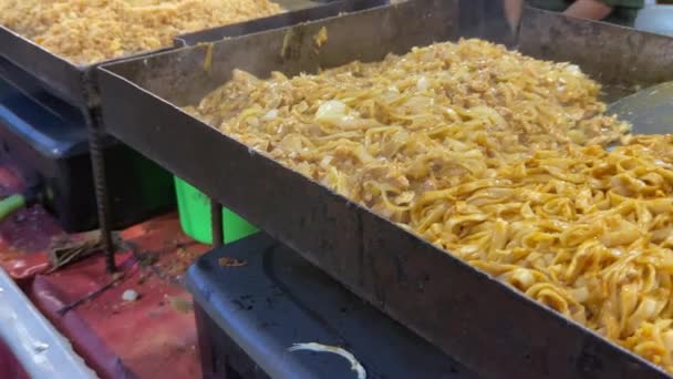 Process Making Flat Rice Noodle Kwetiau Using Flat Pan Fried — Stock Video