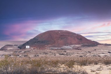 Large Mine Tailings at sunset in Nevada Desert located between Reno and Las Vegas. clipart