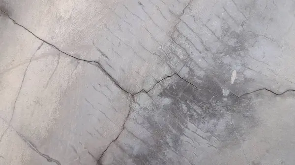 stock image beautiful fine cracks in the cement wall