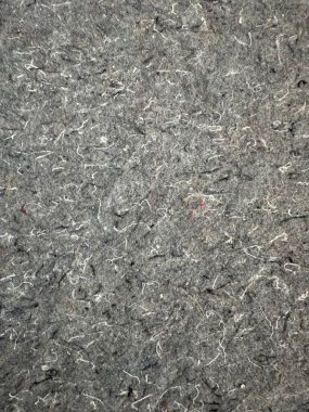 Soyut desenli gri kumaştan oluşan bir fotoğraf..