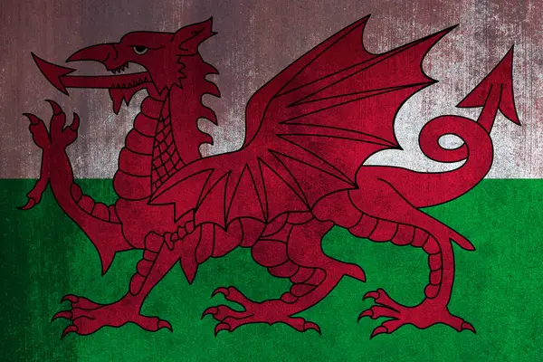 Flag of Wales, Wales Flag, National symbol of Wales country. Fabric and texture Flag of Wales