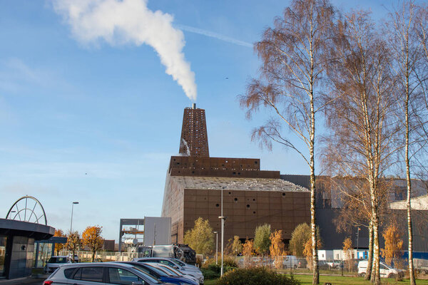 Roskilde, Denmark - September 30, 2022. Large Waste incineration plant in Roskilde city. Waste recycling factory. High quality photo