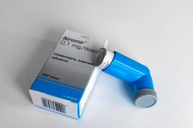 Medicine for asthmatics. Blue inhaler Airomir. Denmark - March 24, 2024 clipart