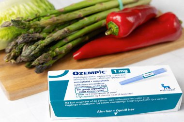  Ozempic Insulin injection pen for diabetics and weight loss. Denmark - April 15, 2024 clipart