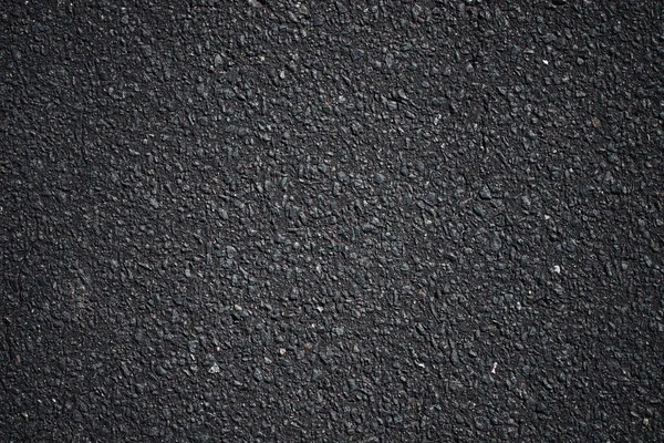 暗いアスファルト表面の背景の質感 — ストック写真
