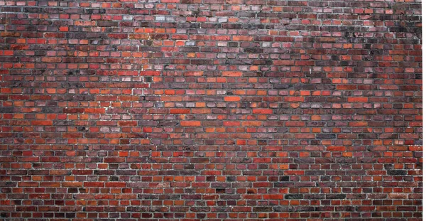 旧红砖墙背景的深色纹理 — 图库照片