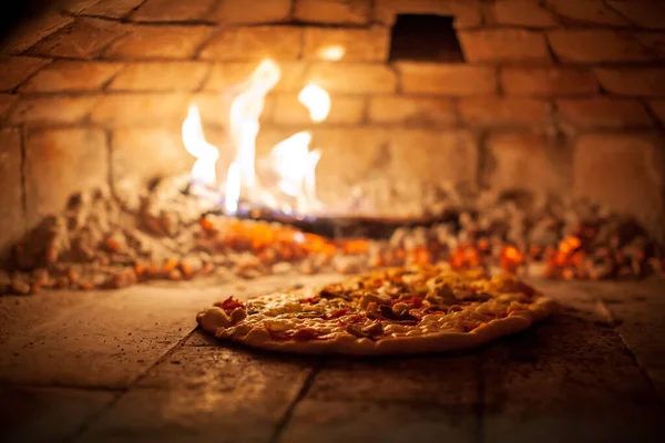 Close Up inside Wooden Fire Oven Italian Pizza Baking Concept