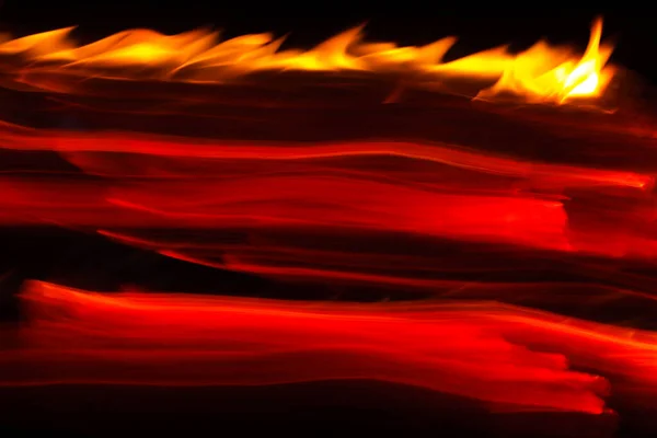 抽象的な火の光のトレイル 長い露出の背景 — ストック写真