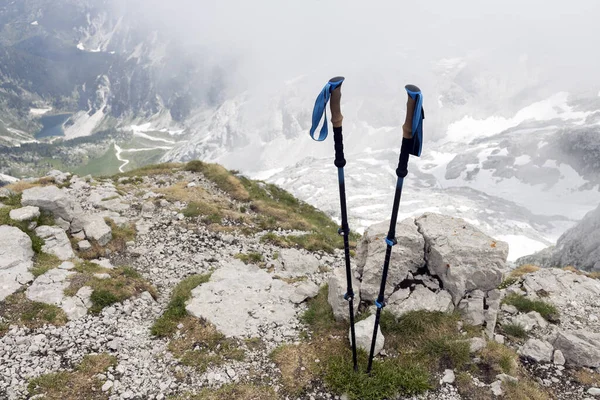 Hiking Poles on Top of a Mountain - Hiking Equipment