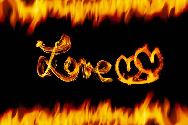 Word love written with fire plus hearts background