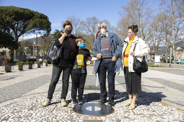 Nova Gorica, Slovenia - April 03, 2021: Family Members Meet after a long Period at Europa Square Symbol of European Open Borders that is Between Nova Gorica in Slovenia and Gorizia in Italy. Closed Borders due to Pandemic Caused a lot of Problems to 