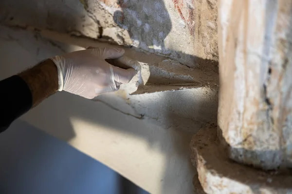 Renovation Work on Gothic Church Columns and Walls. Expert Renovation Preserving European Christianity Heritage