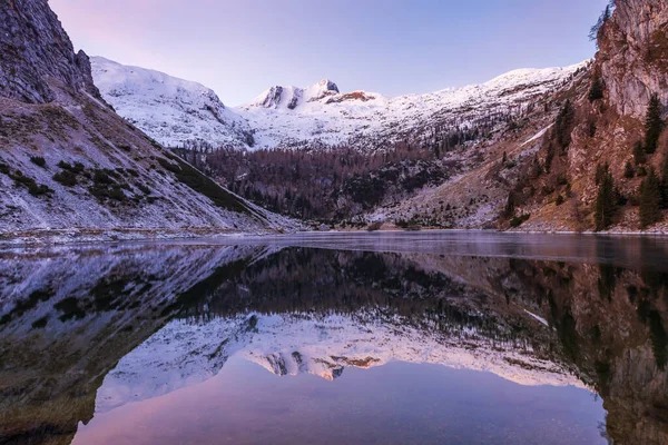 Winter Morning Reflections of Mountains in Calm Water of an Alpine Lake - Krn Lake, Slovenia